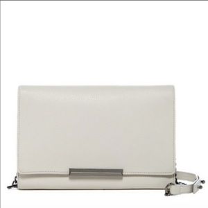 Botkier genuine leather clutch/shoulder purse.
